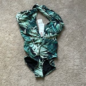 Bathing suit. Never worn. From shop red dress. Tags attached.